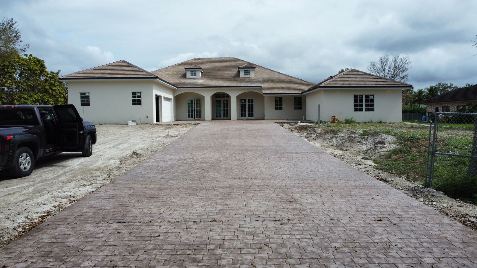 Long brick paver driveway by Concrete Solutions Today, Broward County, FL