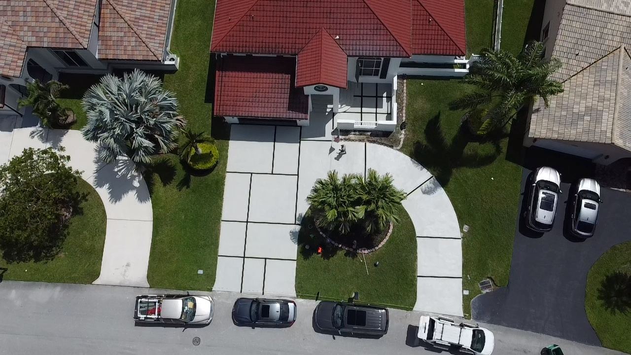 Circular concrete driveway at a South Florida home by Concrete Solutions Today, Broward County, FL
