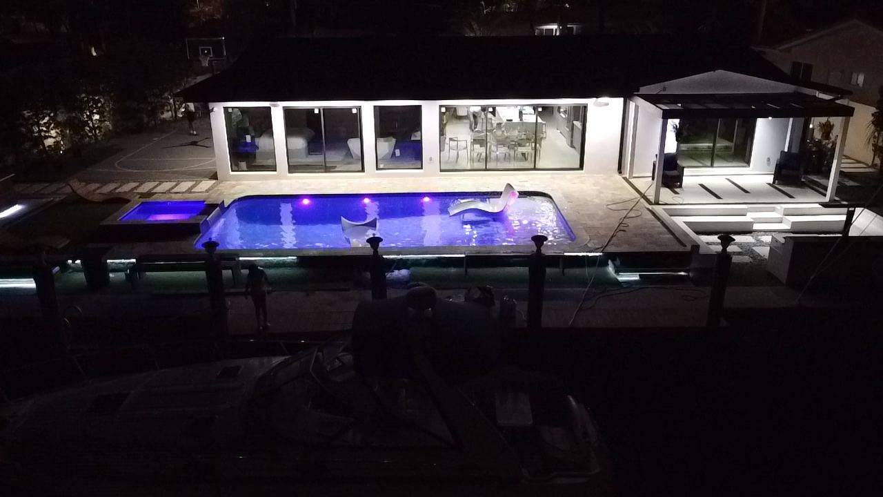 Custom pool with LED lighting at night