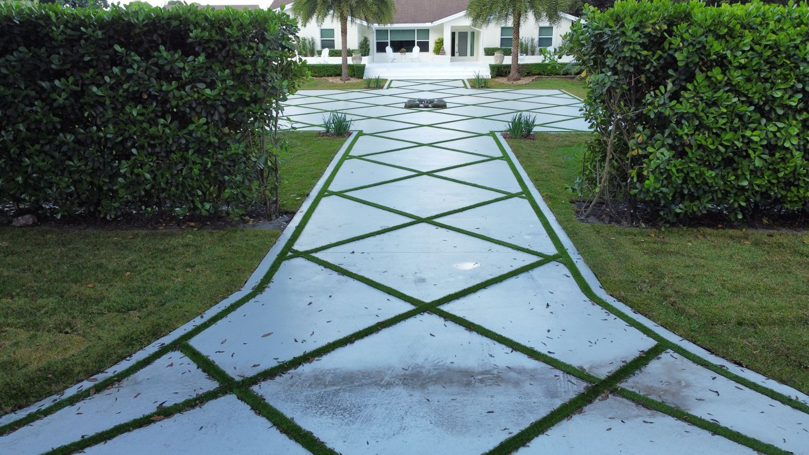Diamond-pattern concrete driveway by Concrete Solutions Today, serving Plantation Acres, FL