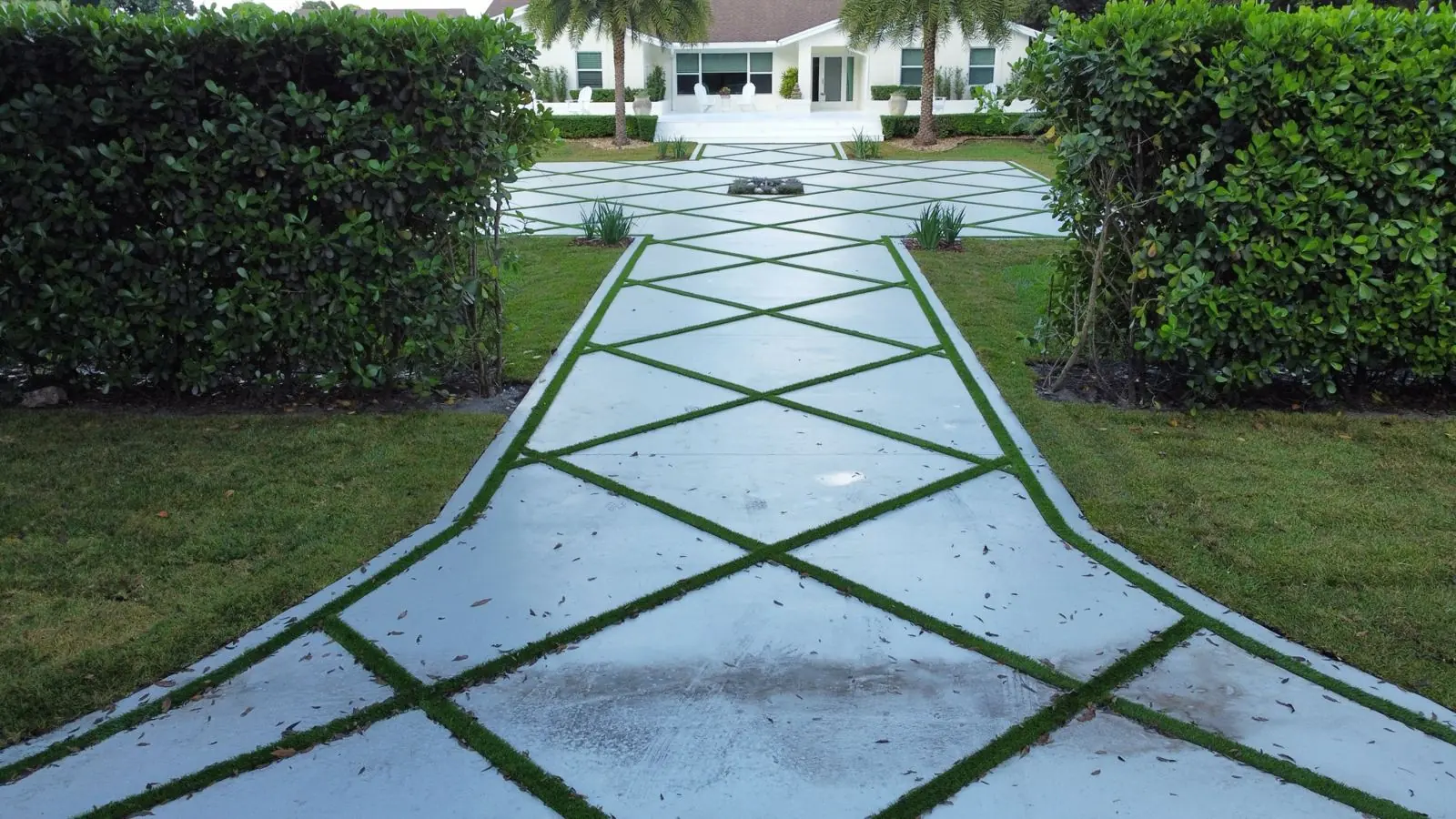 Diamond-pattern concrete driveway with grass joints, Plantation or Coral Springs, Florida