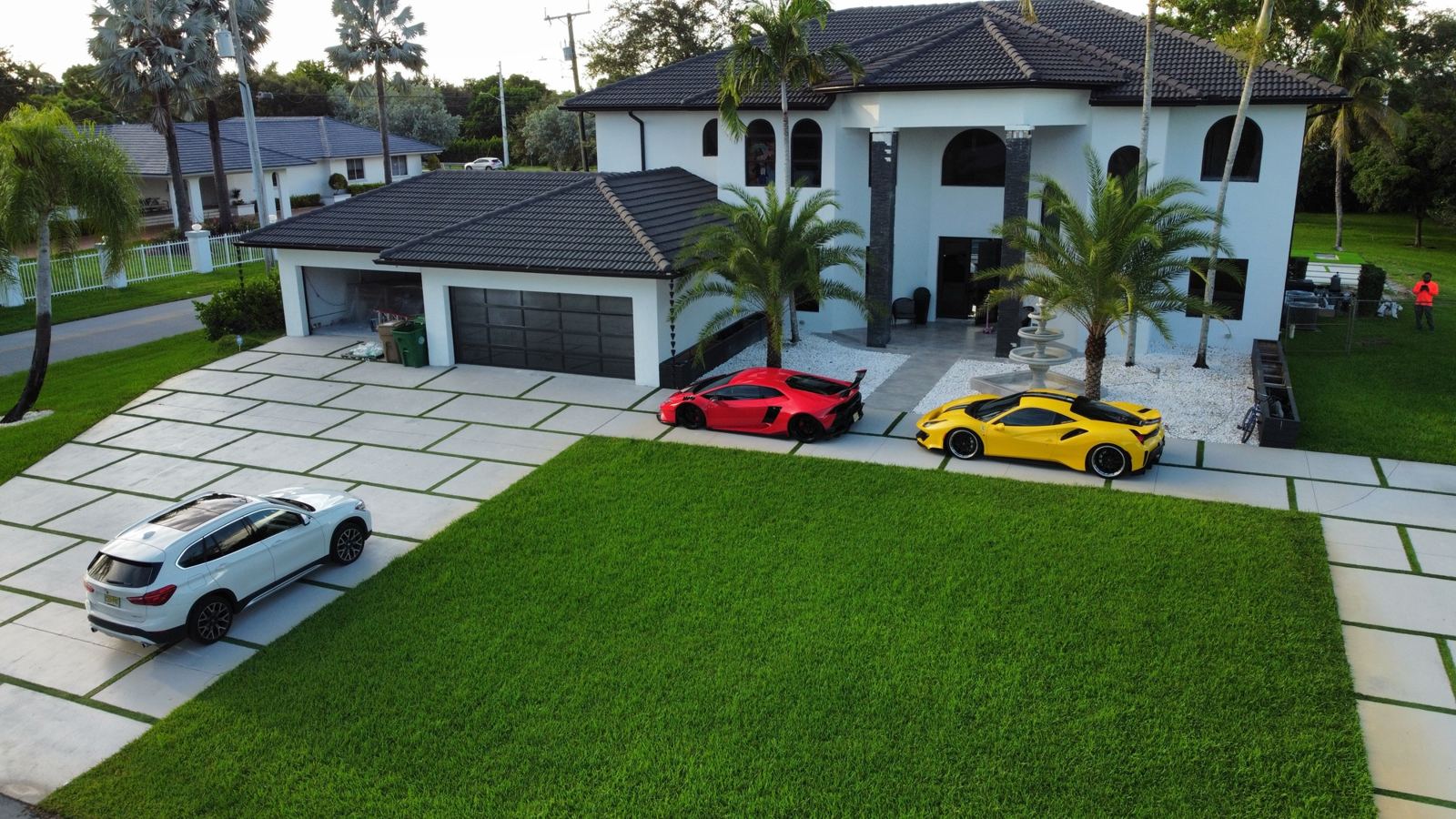 Large artificial turf lawn and concrete driveway, Plantation or Coral Springs, Florida