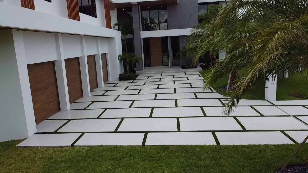 Modern concrete slab driveway with grass joints, Plantation or Coral Springs, Florida