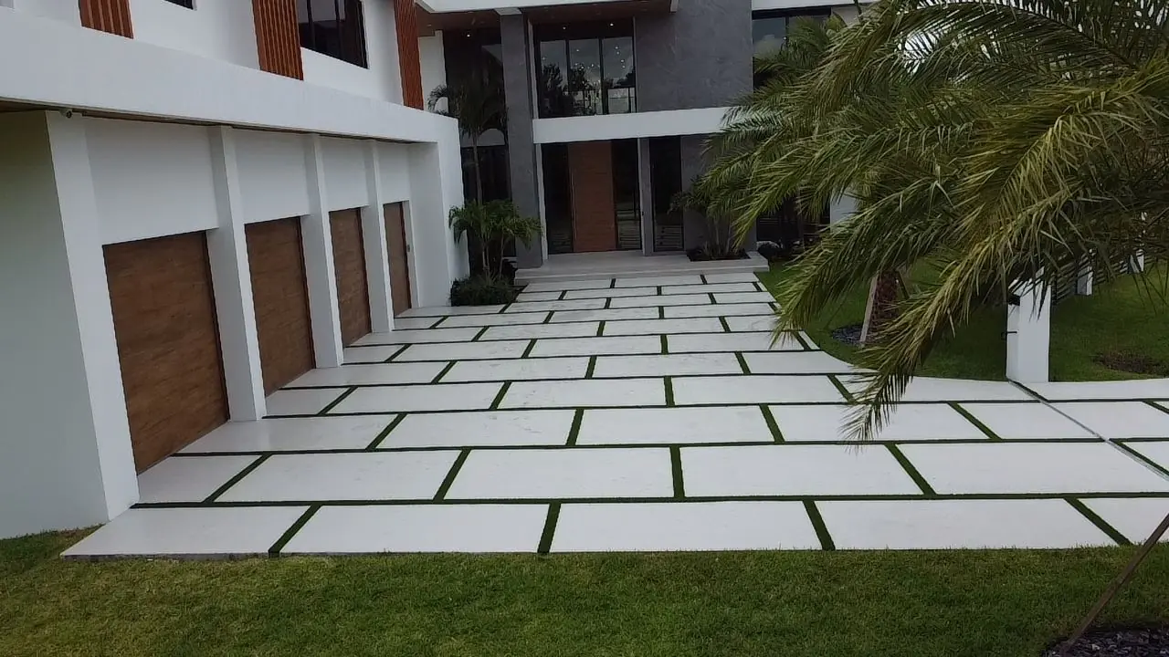 Modern concrete slab driveway with grass joints, Plantation or Coral Springs, Florida