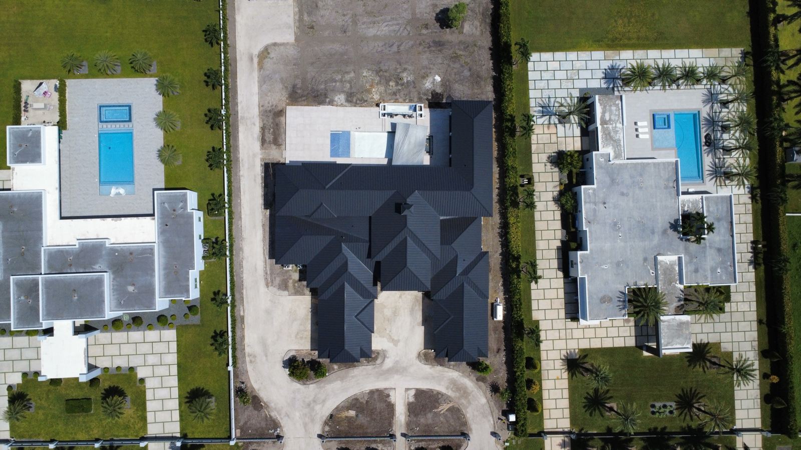 Aerial view of new homes with pools under construction, Broward County, Florida