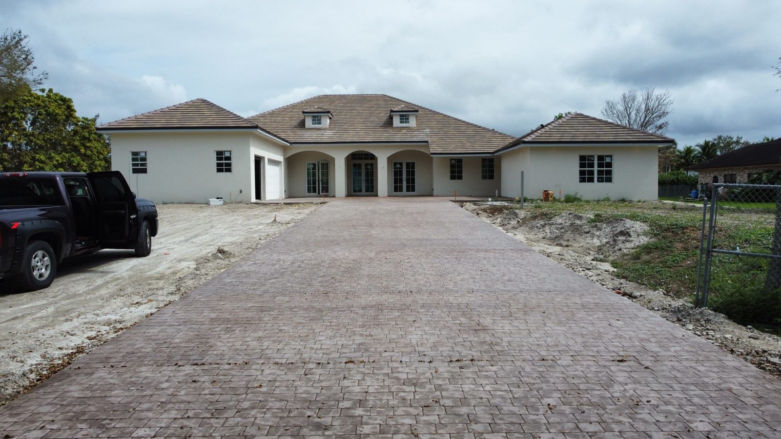 Finished stamped concrete driveway by Concrete Solutions Today, Parkland, FL