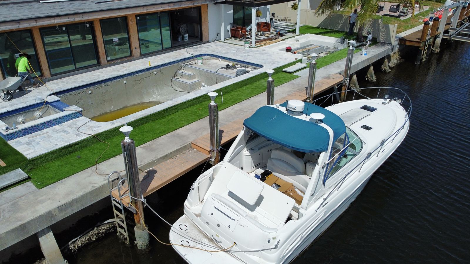 Waterfront pool deck and turf by the dock, Plantation or Coral Springs, Florida