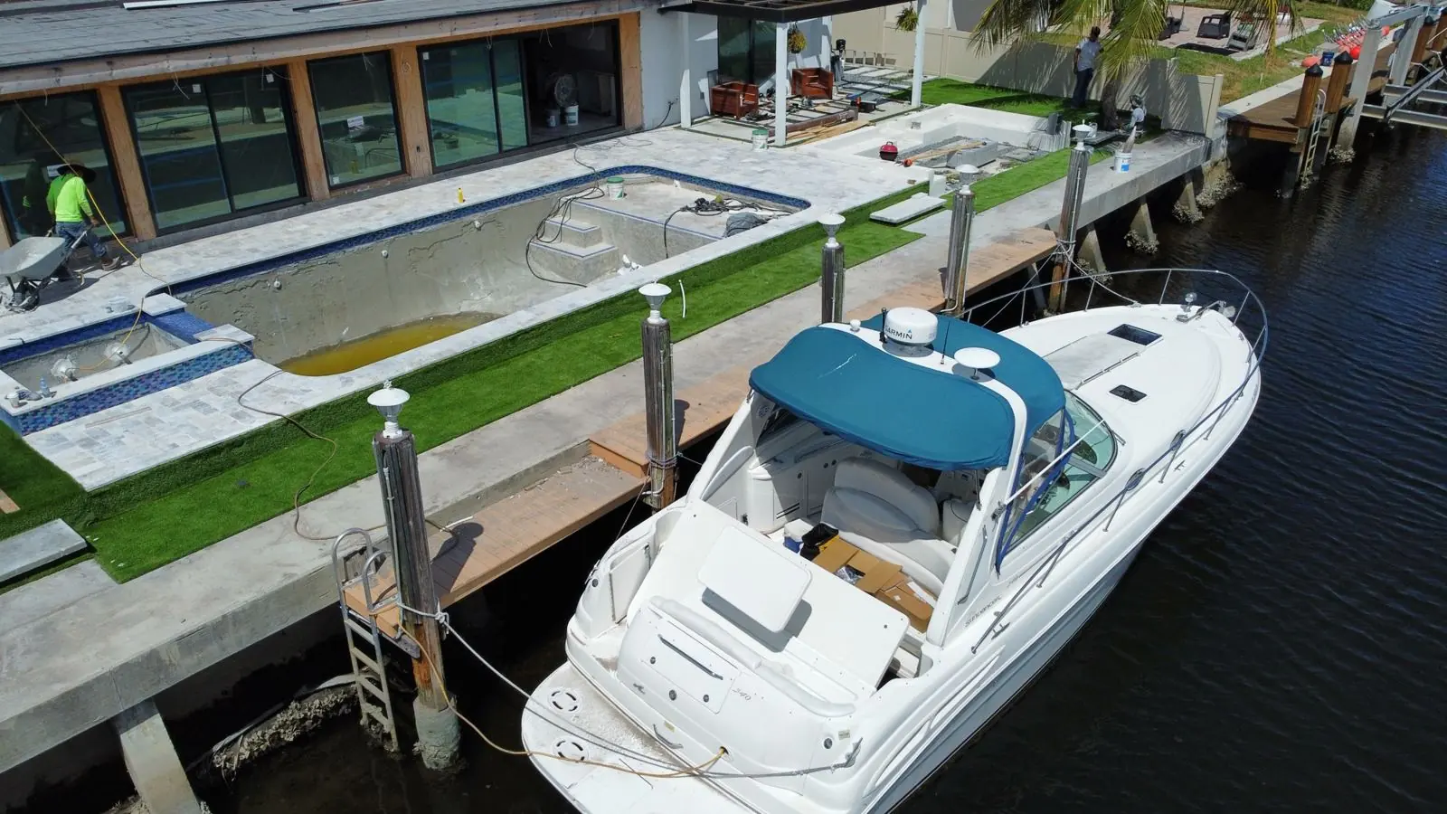Waterfront pool deck and turf by the dock, Plantation or Coral Springs, Florida