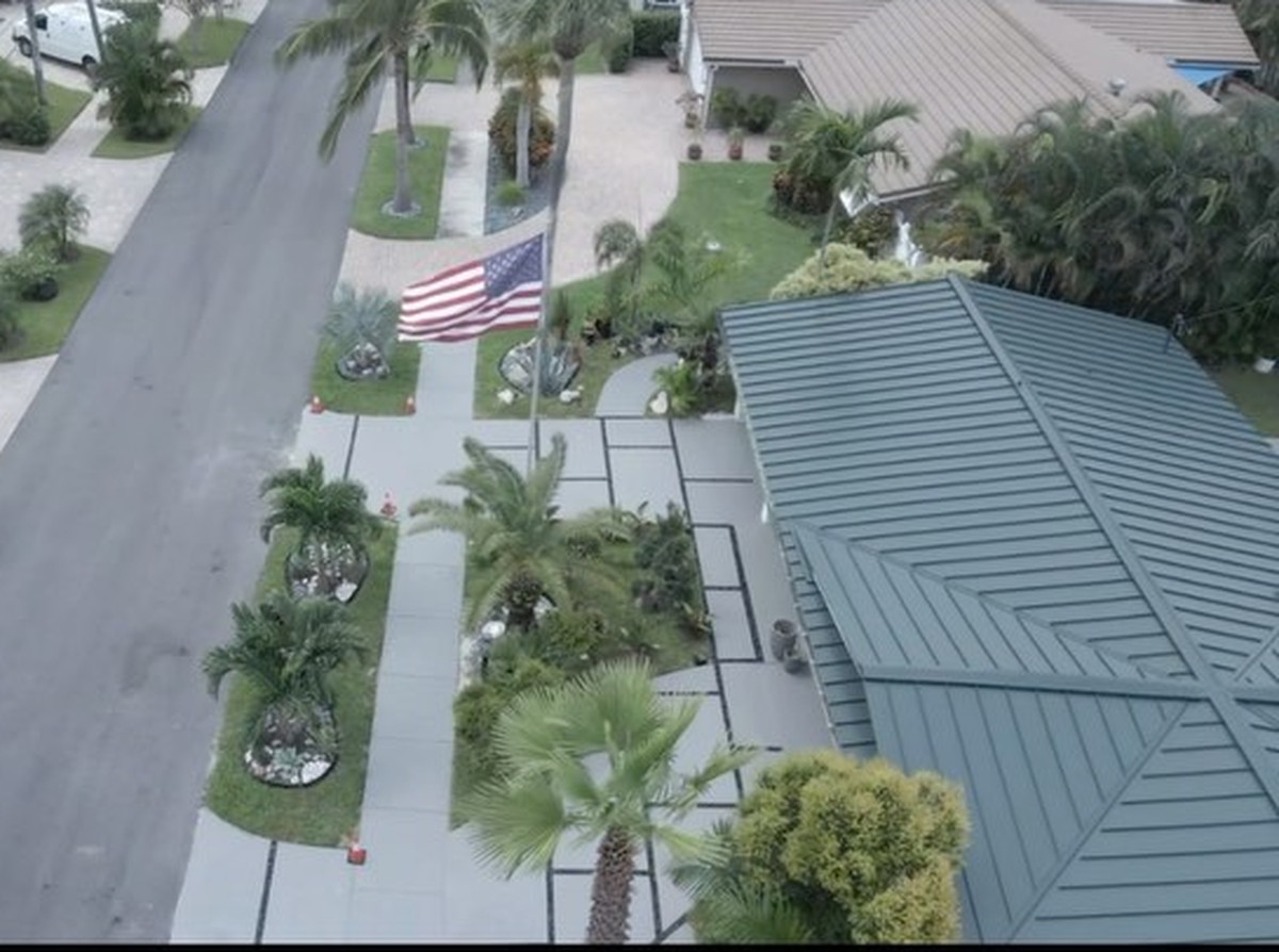 Aerial view of a modern rock driveway and walkway at a Wilton Manors home by Concrete Solutions Today